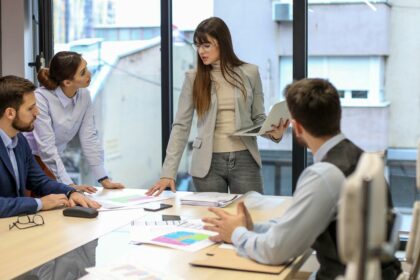 four experts in meeting room