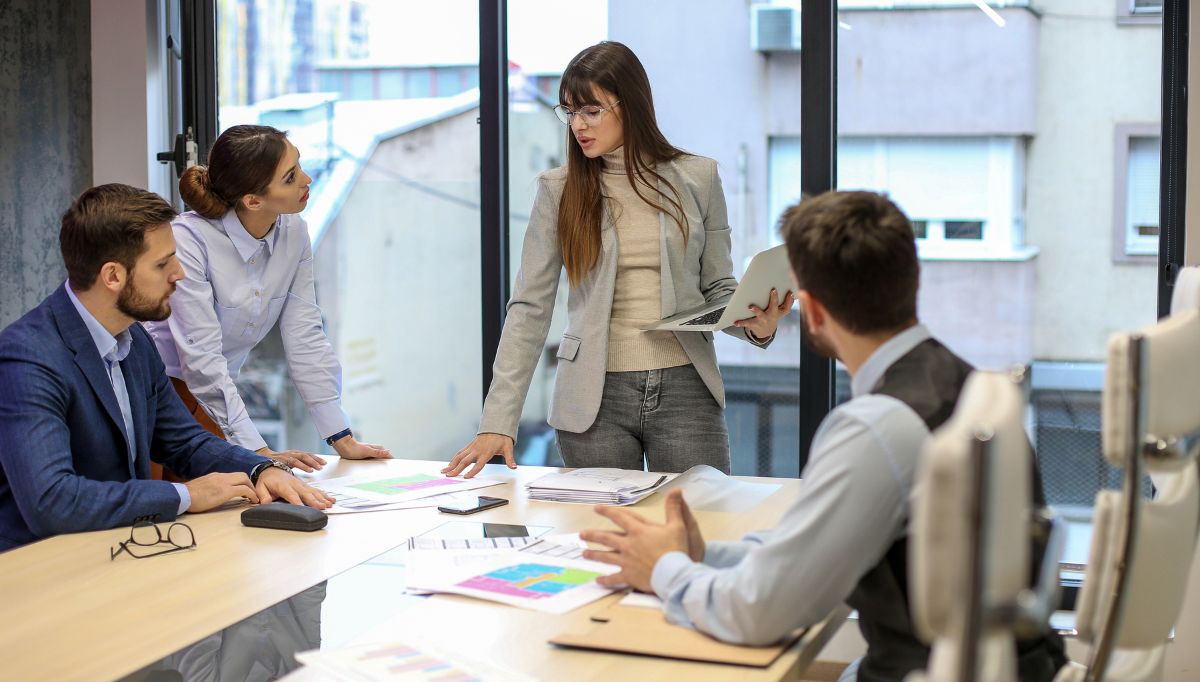 four experts in meeting room