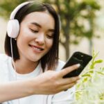 asian woman listening music