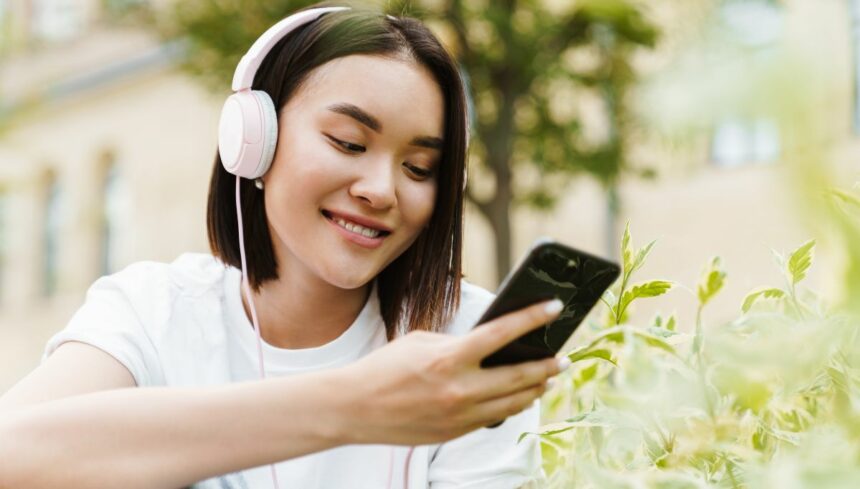 asian woman listening music