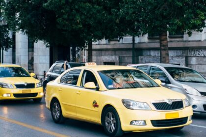 yellow taxi cabs on the road