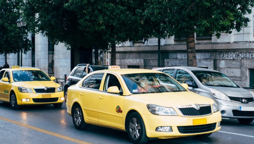 yellow taxi cabs on the road