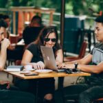 People discussing in a cafe