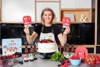 Coles ambassador Courtney Roulston is supporting the Coles SecondBite Christmas Appeal