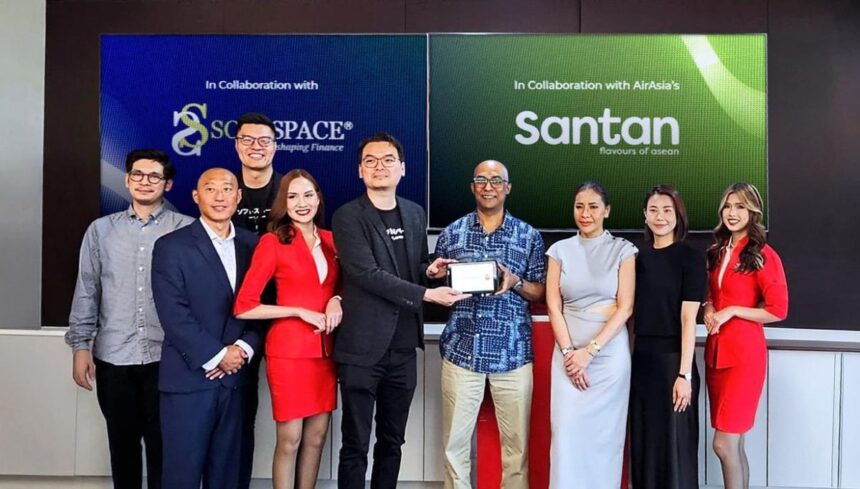 Key leaders from Soft Space, AirAsia, Santan, and Zebra Technologies, along with AirAsia cabin crew, celebrate the collaboration at the event