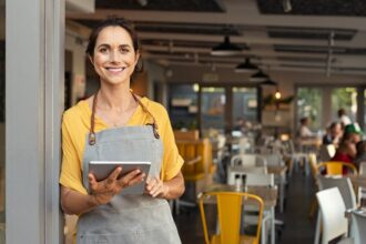 small business owner at entrance