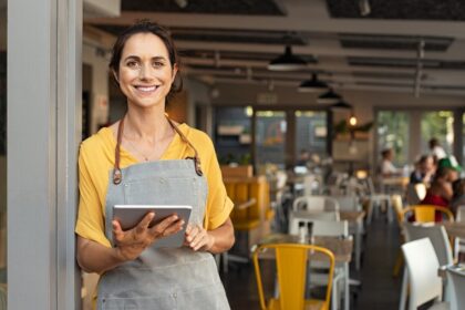 small business owner at entrance